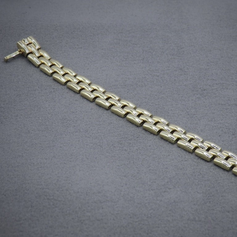 A gold link bracelet