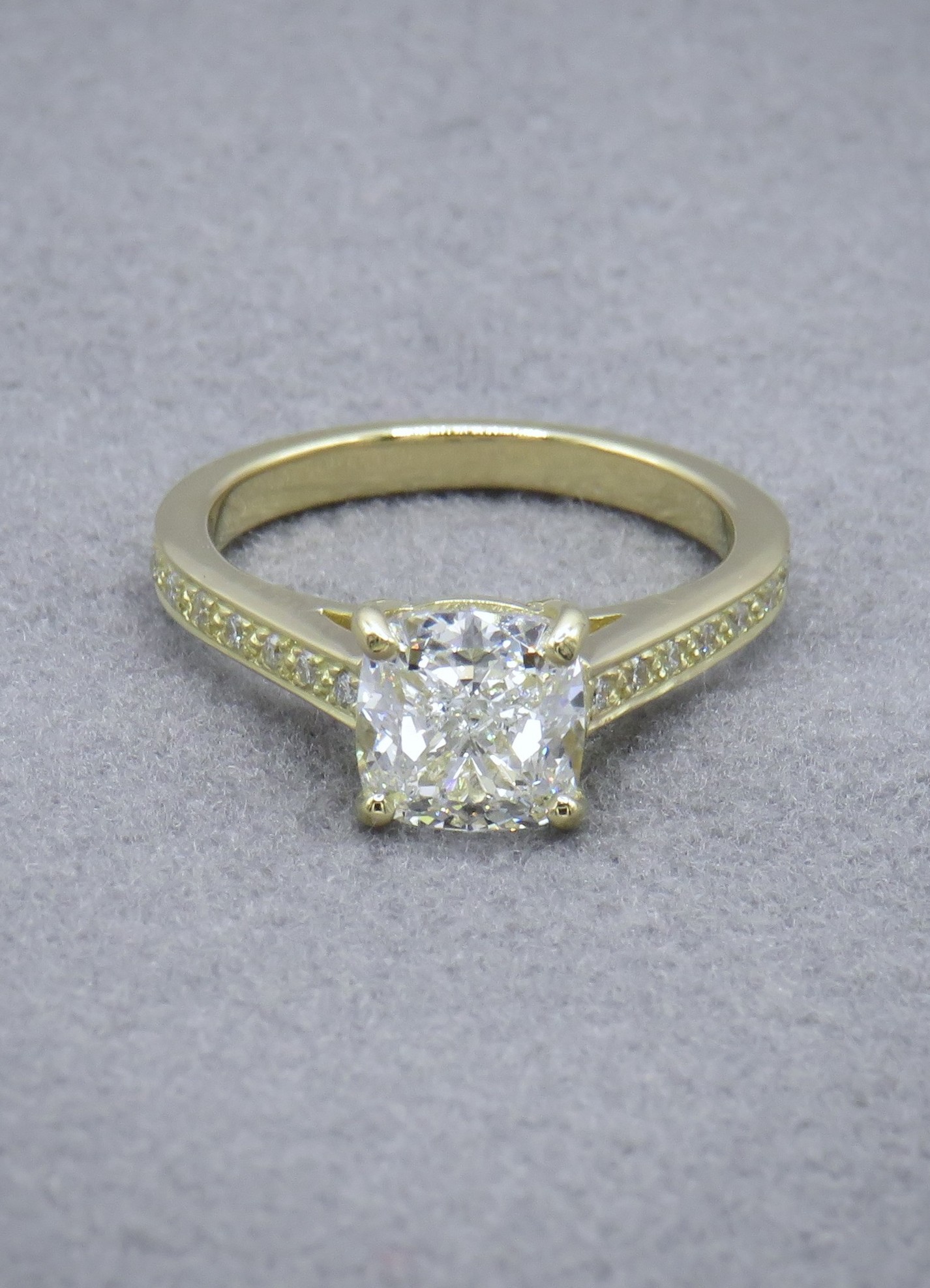 Cushion Cut diamond ring with diamond shoulders
