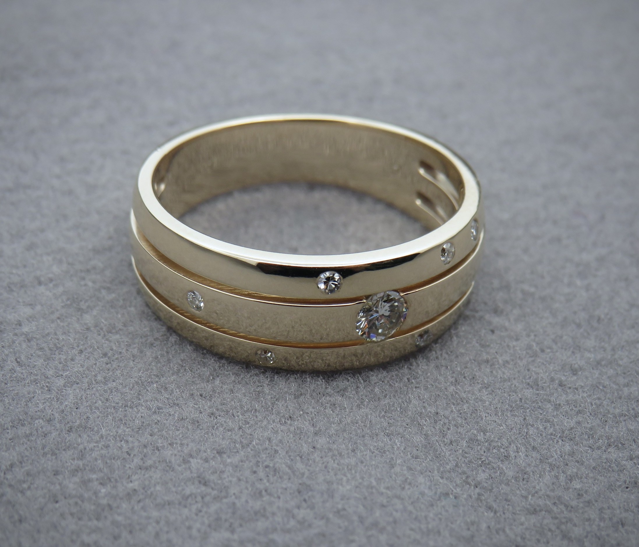 Gold and diamond gypsy set ring